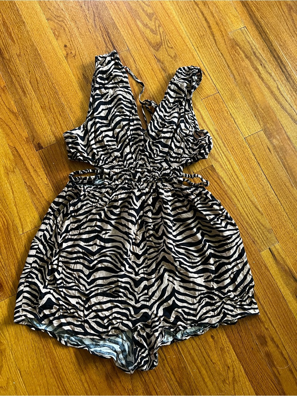 Women's Zebra-Print Sleeveless Romper in Black and White